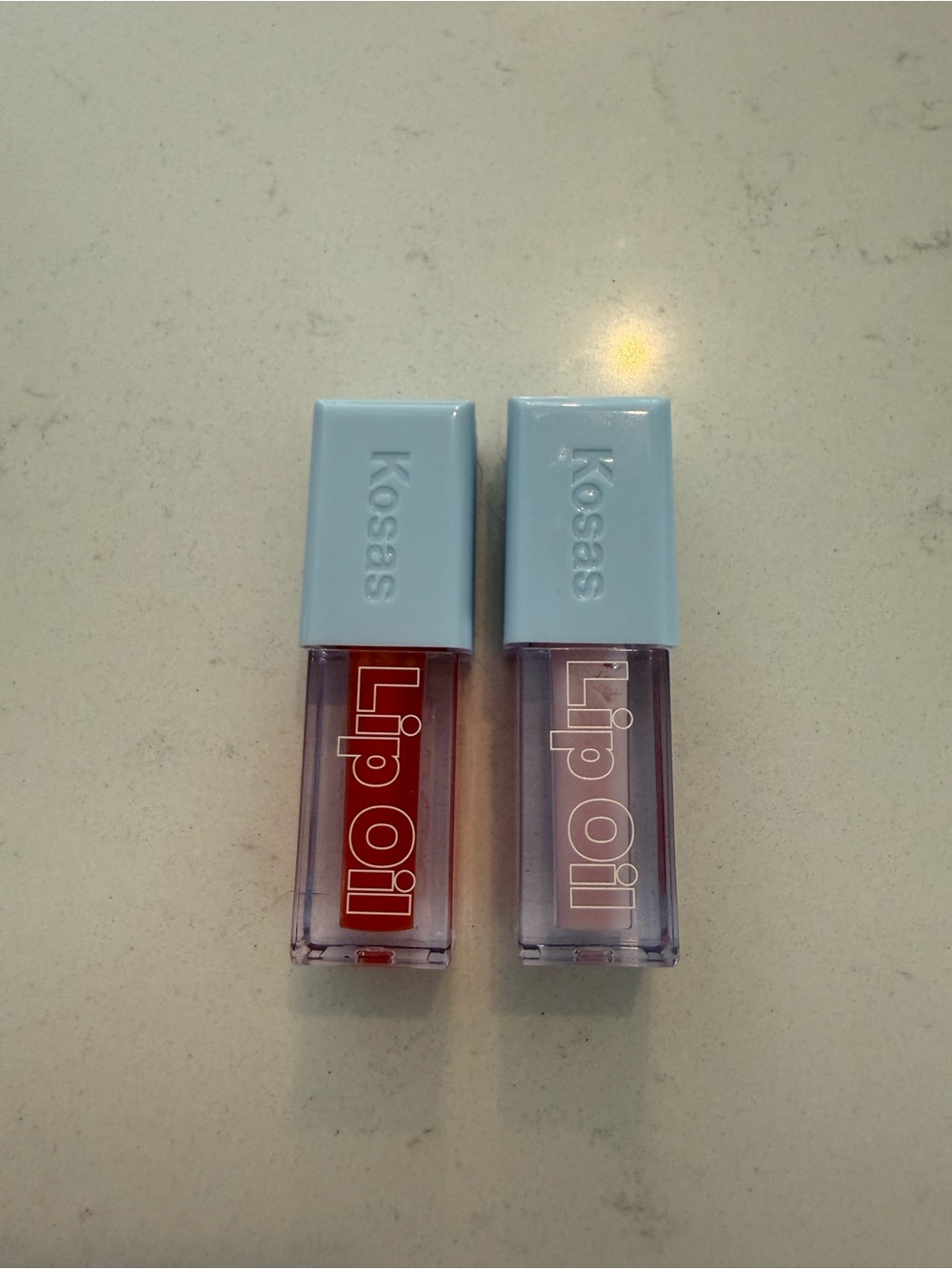 Kosas Lip Oil Duo - Light Blue Caps with Red & Clear Oils